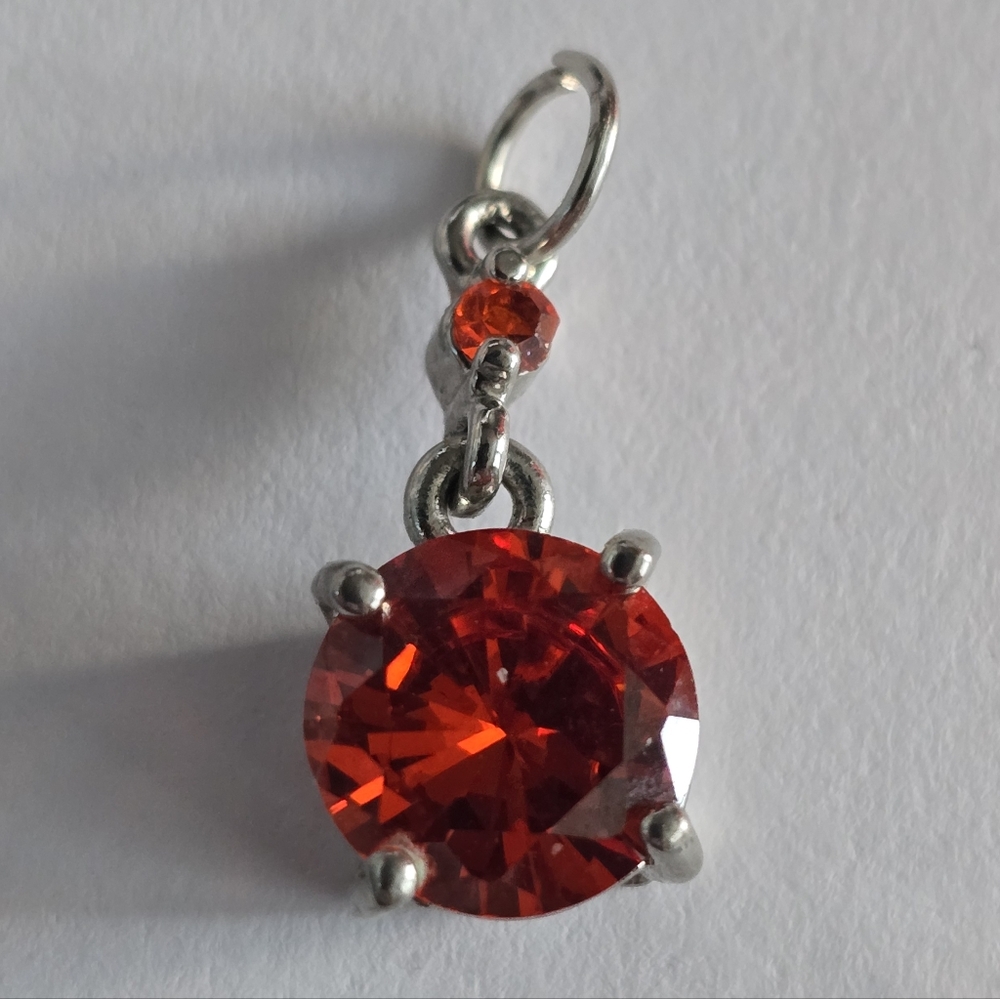 Red gems pendant silver tone round faceted dainty